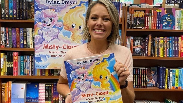 Dylan Dreyer holding her book