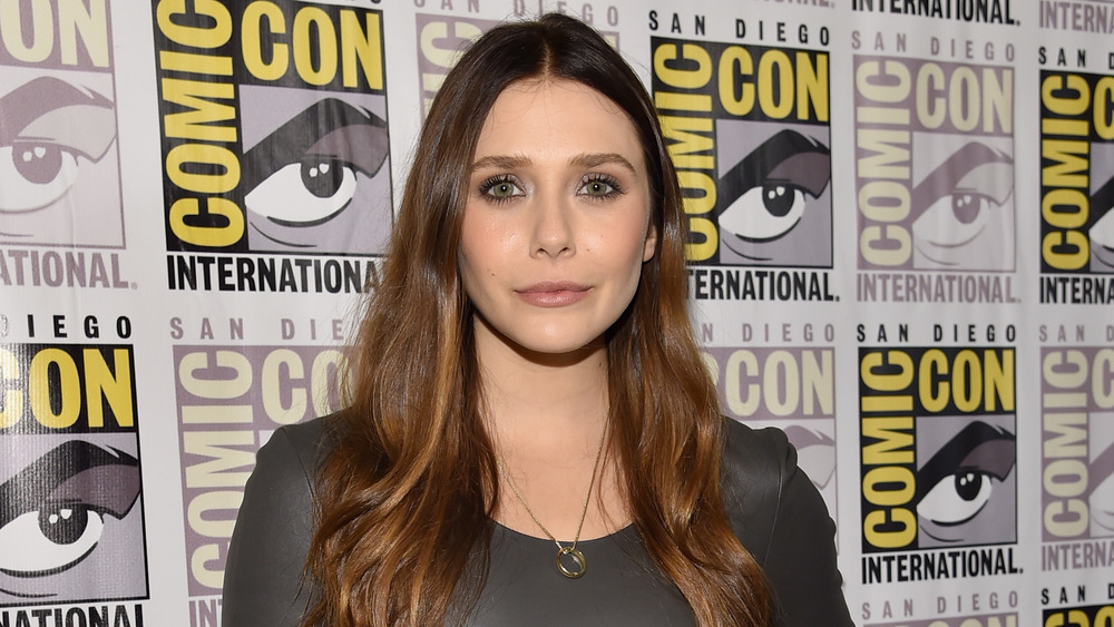 Elizabeth Olsen smirking at Comic Con