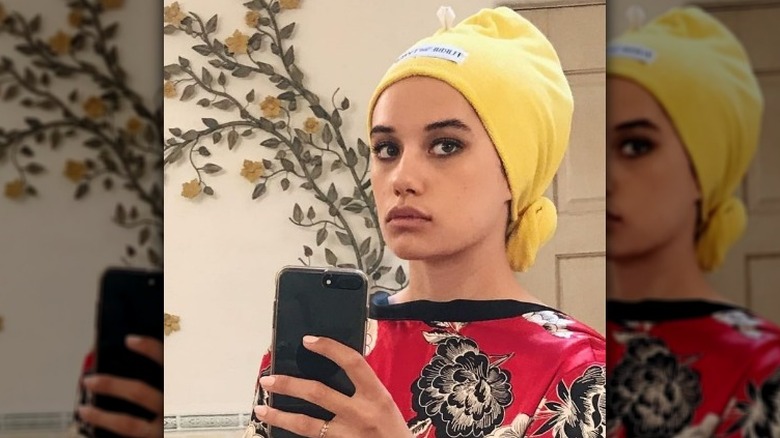 Ella Bleu Travolta wearing yellow head wrap