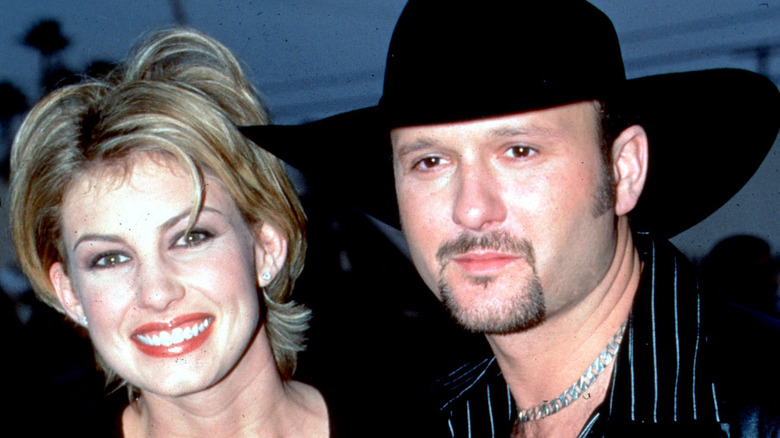 Young Faith Hill and Tim McGraw smiling