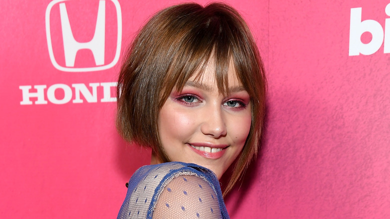 Grace VanderWaal looking over shoulder