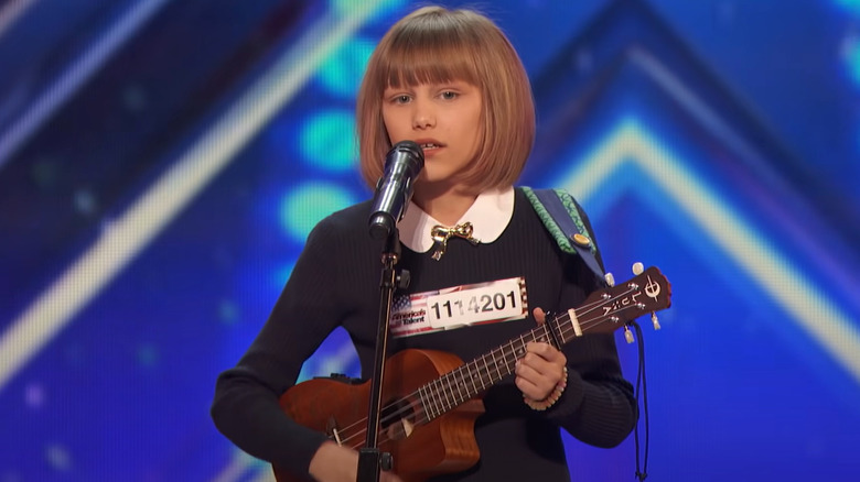 Grace VanderWaal playing ukulele