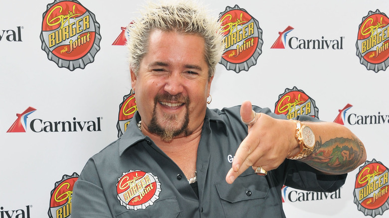 Guy Fieri pointing while posing