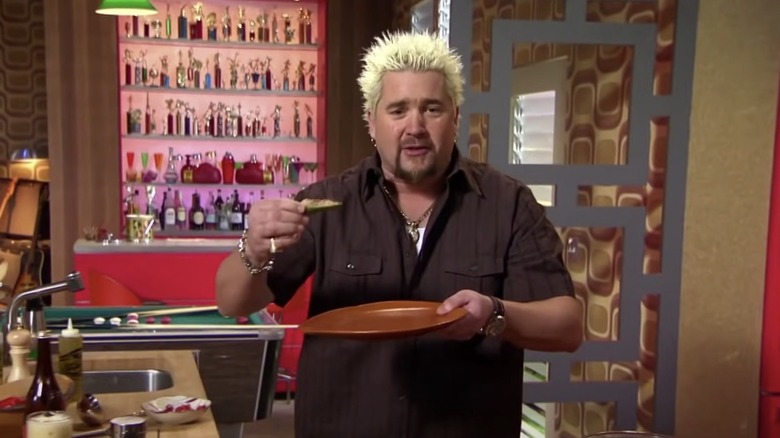 Guy Fieri cooking on TV