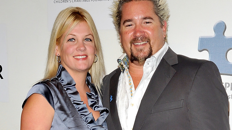 Guy Fieri, wife Lori posing together