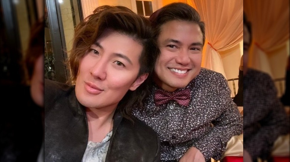 Guy Tang and husband posing for a selfie 