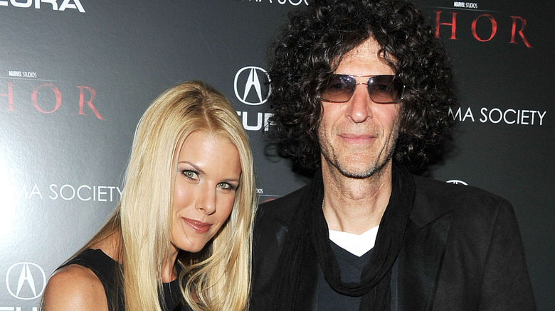 Howard Stern, Beth Ostrosky posing