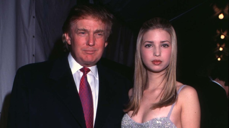 Donald Trump and a teenage Ivanka Trump posing with neutral expressions