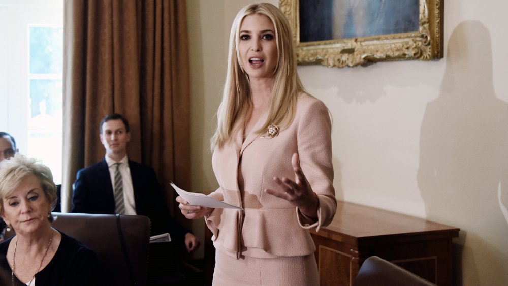 Ivanka Trump in a peach skirt-suit, speaking during a cabinet meeting in 2018