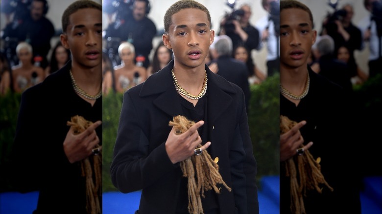 Jaden Smith carrying a handful of hair on the Met Gala carpet