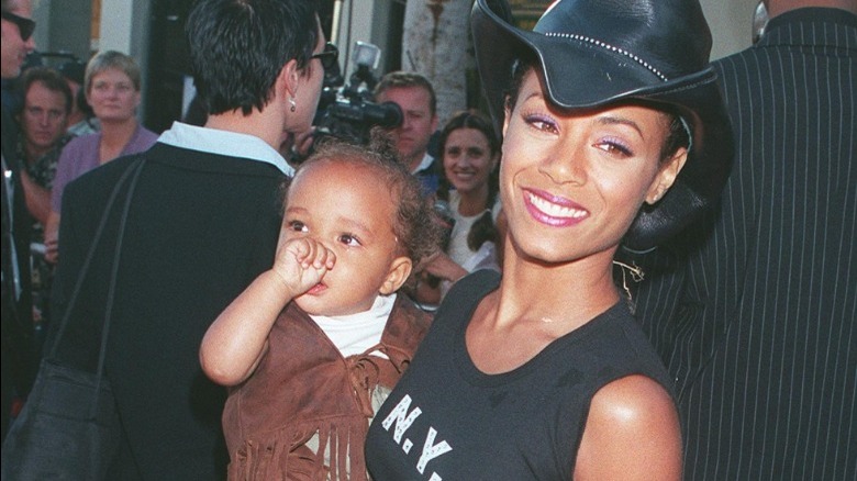 Jada Pinkett Smith holding baby Jaden