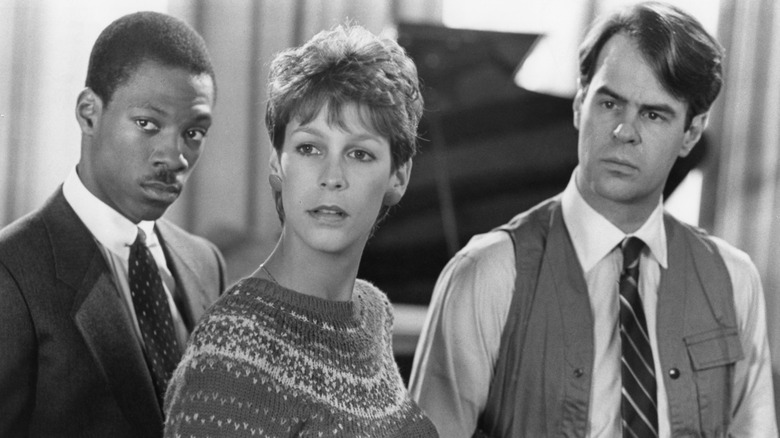 Jamie Lee Curtis with Eddie Murphy and Dan Aykroyd in "Trading Places"