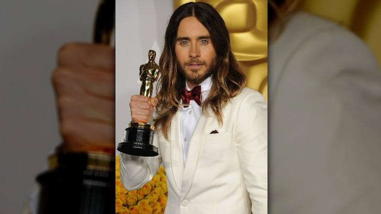 Jared Leto holding an Oscar