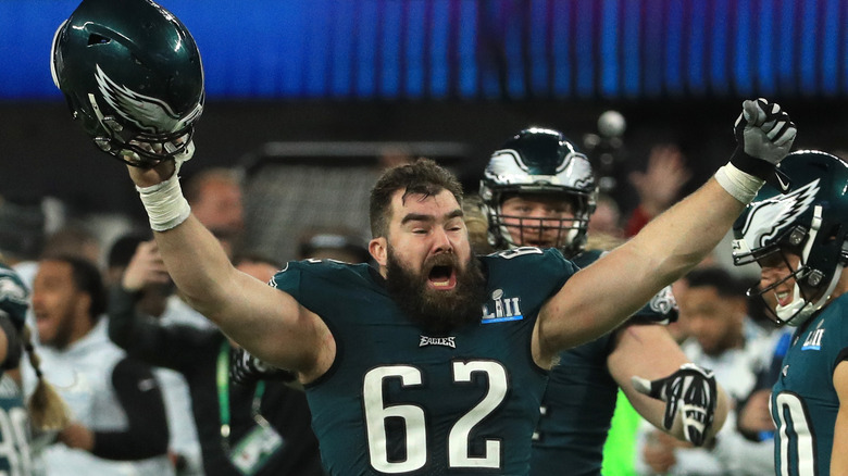 Jason Kelce celebrating with his arms up and mouth open