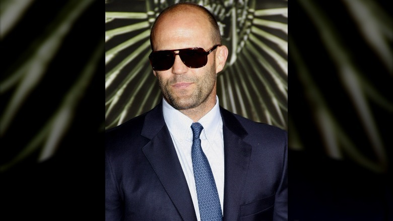 Jason Statham attends Expendables premiere in shades