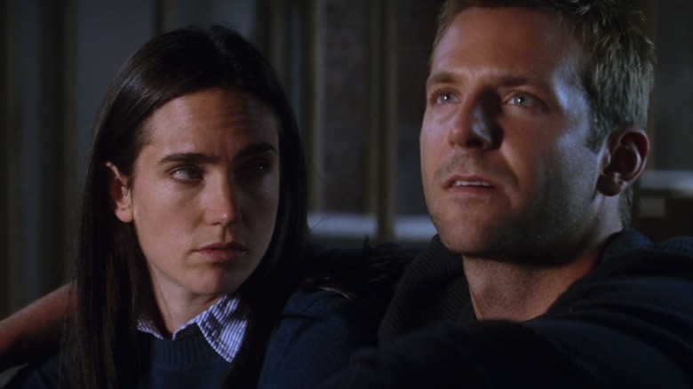 Jennifer Connelly looking at Bradley Cooper