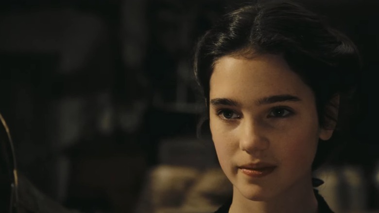 Young Jennifer Connelly smiling