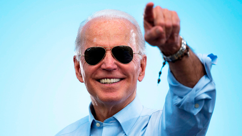 Joe Biden in aviators, smiling