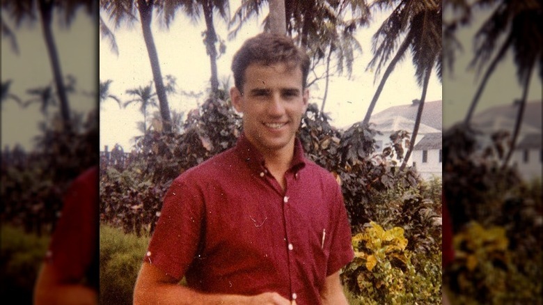 Joe Biden in front of palm trees