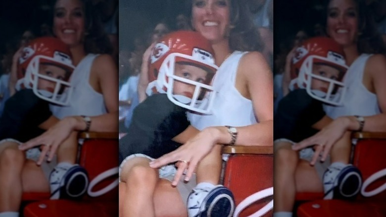 Joe Burrow sitting in his mom's lap as a child