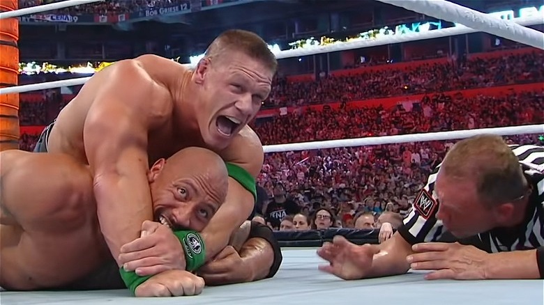 John Cena wrestling The Rock