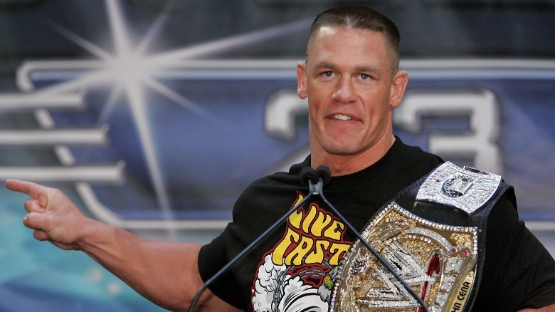 John Cena holding spinner belt