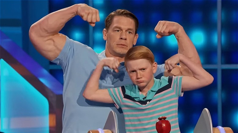 John Cena flexing with fifth grader