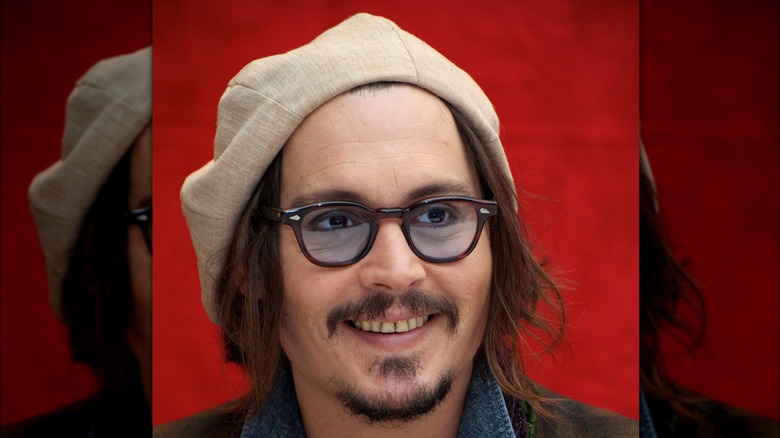 Johnny Depp smiling yellow teeth