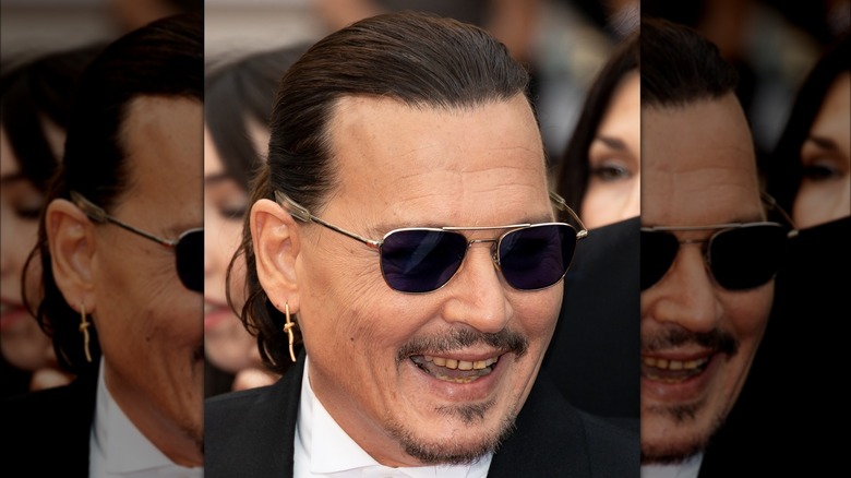 Johnny Depp smiling brown teeth