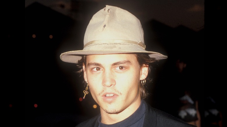 Johnny Depp solemn tan hat