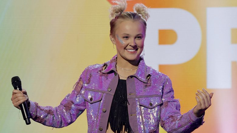 JoJo Siwa smiling on stage