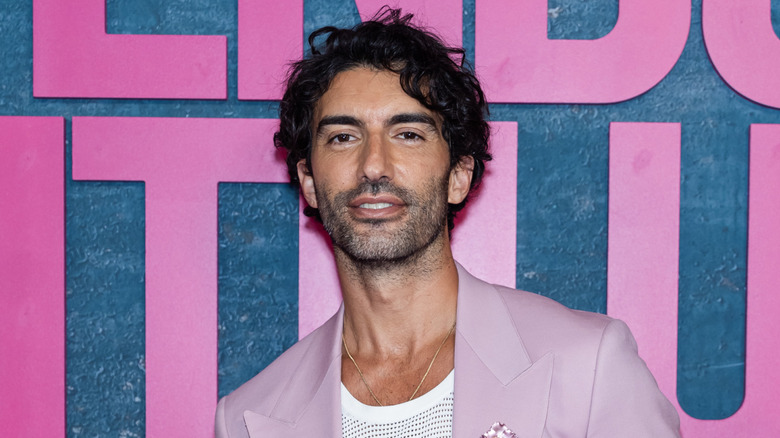 Justin Baldoni posing on the red carpet