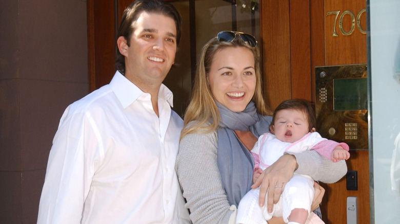 Donald Trump Jr. and Vanessa pose with Kai as a newborn baby