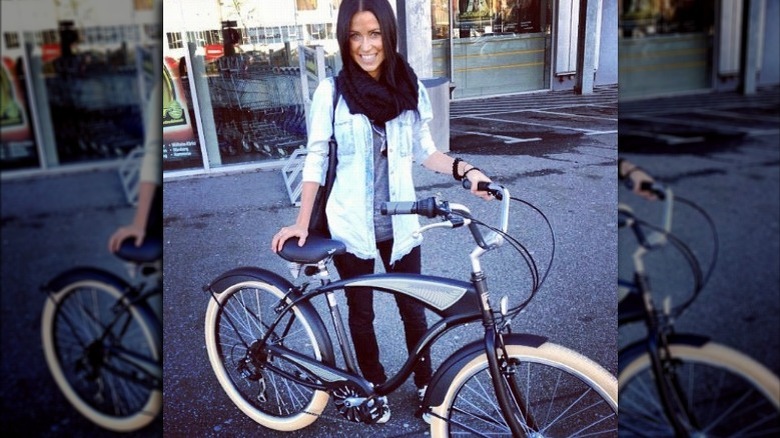 Kaitlyn Bristowe with a bike