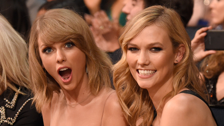 Taylor Swift and Karlie Kloss smiling