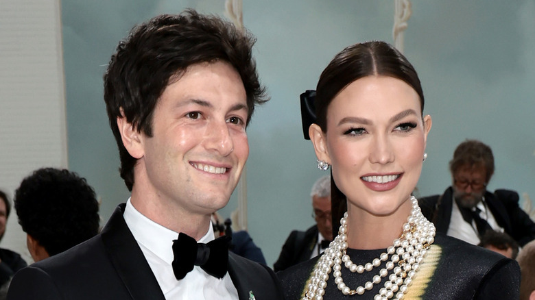 Karlie Kloss and Joshua Kushner smiling