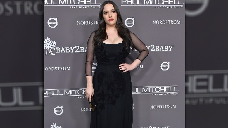 Kat Dennings in a black dress