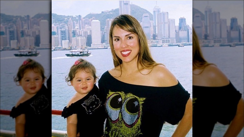 Kelly Dodd posing with baby Jolie