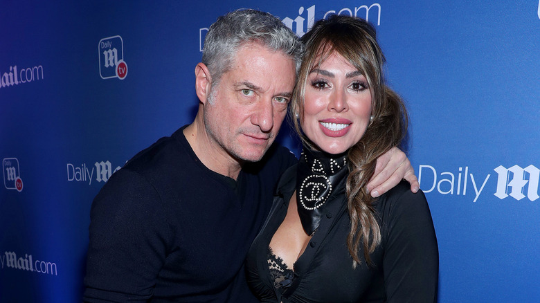 Rick Leventhal and Kelly Dodd attending the DailyMail.com and DailyMailTV 2019 holiday party