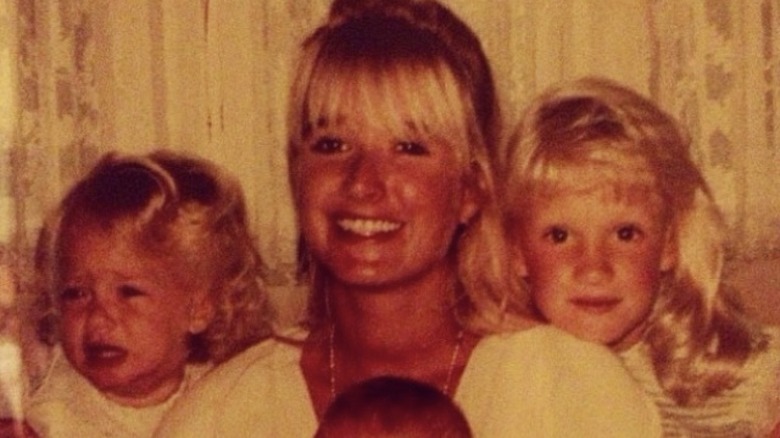 Kim Richards, smiling with her kids