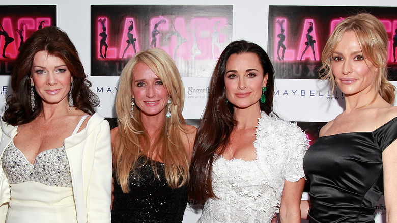 Kim Richards posing with The Real Housewives of Beverly Hills cast