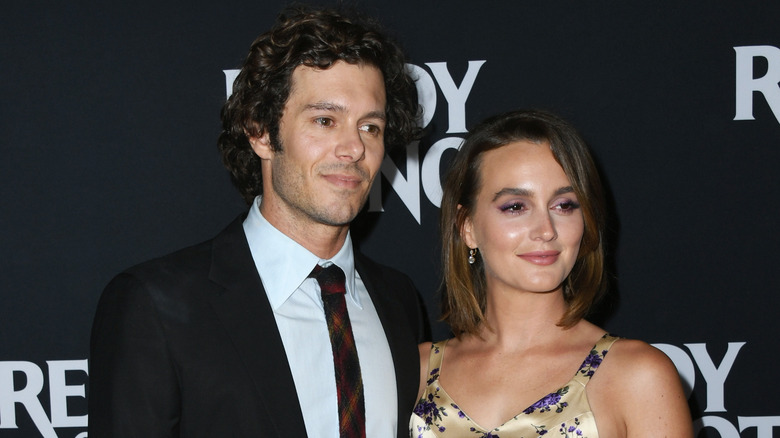 Leighton Meester and Adam Brody posing in 2019