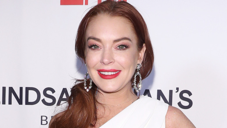 Lindsay Lohan with ponytail on shoulder