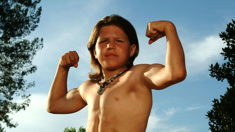 Richard Sandrak, known as Little Hercules, in a bodybuilding pose