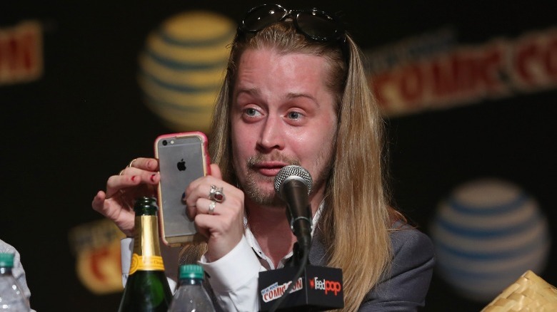 Macaulay Culkin with long hair