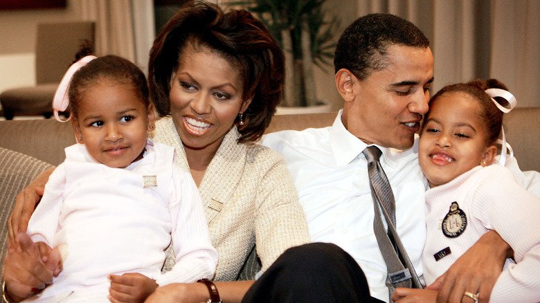 The Obamas sitting together in 2004