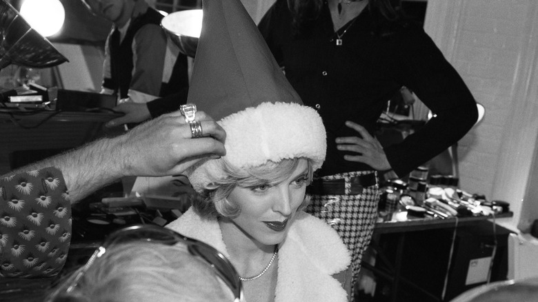 Marla Maples wearing a Santa hat