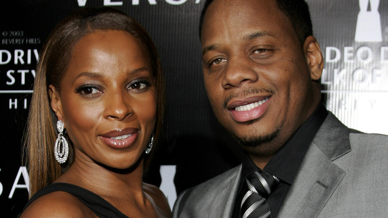 Mary J. Blige and Kendu Isaacs at the Rodeo Drive Walk Of Style Award honoring Gianni and Donatella Versace