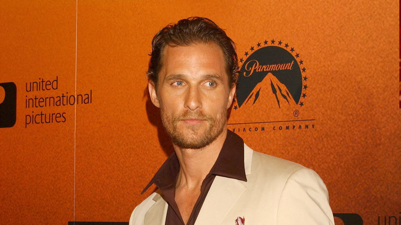 Matthew McConaughey poses in beige suit in 2005