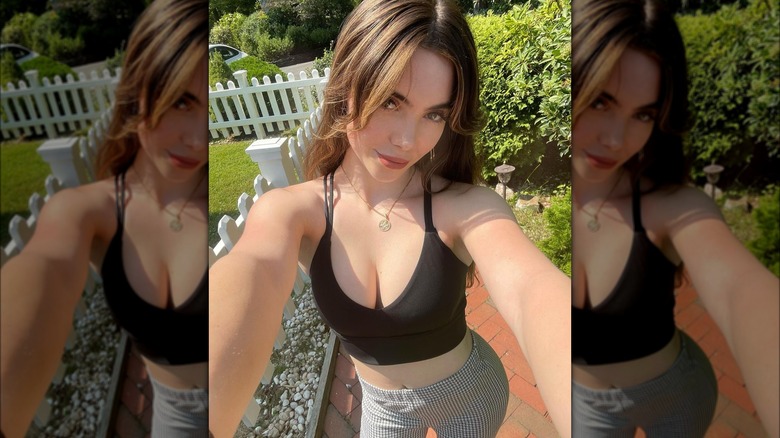 McKayla Maroney taking selfie outdoors